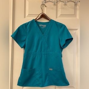 Scrub top and bottom. Size small petite.